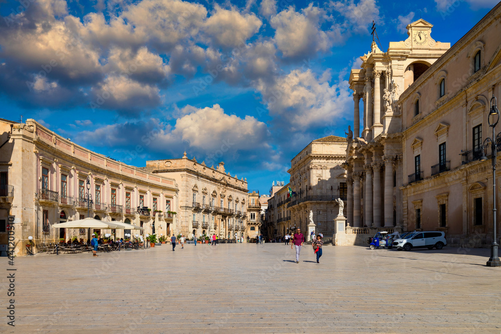 Panorama of Piazza Duomo and of the Cathedral of Syracuse, Sicily, Italy. Baroque cathedral in the historic center of the island, Piazza Duomo of Ortigia in Syracuse, in Sicily, Italy.
