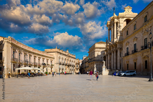 Panorama of Piazza Duomo and of the Cathedral of Syracuse, Sicily, Italy. Baroque cathedral in the historic center of the island, Piazza Duomo of Ortigia in Syracuse, in Sicily, Italy. photo