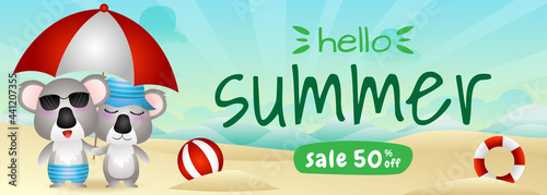 summer sale banner with a cute koala couple using umbrella in beach photo