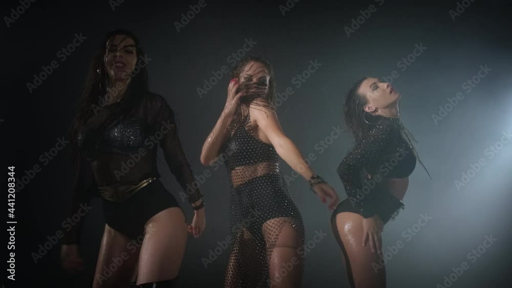 rehearsal of go-go dancing female group, three sexy women are moving sexually rehearsal of go-go dancing female group, three sexy women are moving sexually