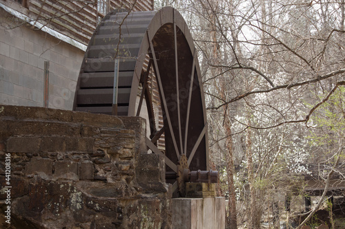 Old wooden waterwheel on a mill