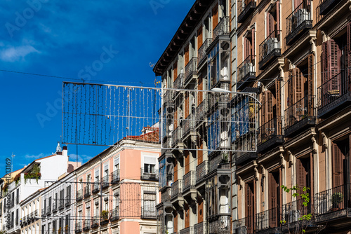 Low Angle View of Old Residential Building in Central Madrid. Real Estate market and rent regulation concepts photo