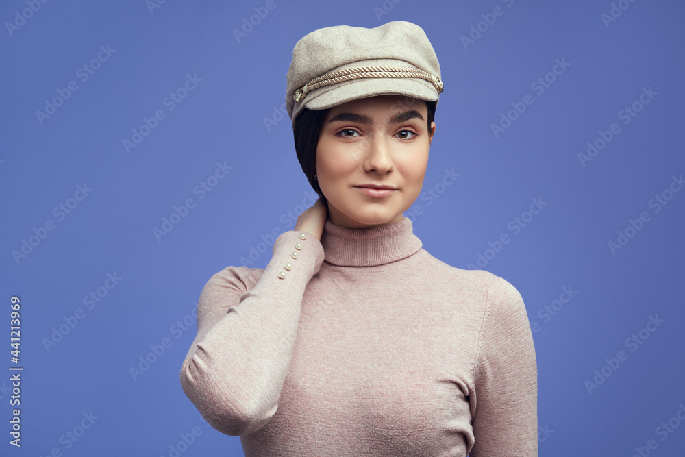 Young cute girl dressed in casual clothes smiling over purple background Young cute girl dressed in casual clothes smiling over purple background