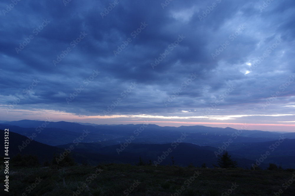 Dawn sky over the village in the Ukrainian Carpathians