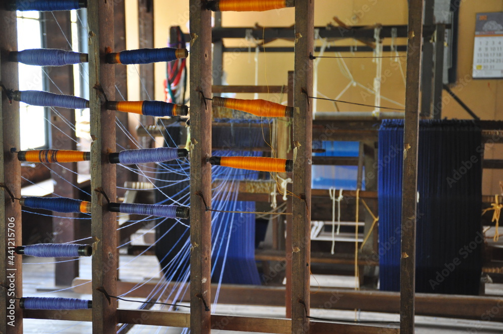 A weaving machine in a factory in Sri Lanka A weaving machine in a factory in Sri Lanka