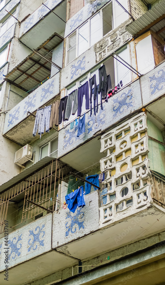 Colorful facade of a Soviet-built house. Derbent, Dagestan, Russia