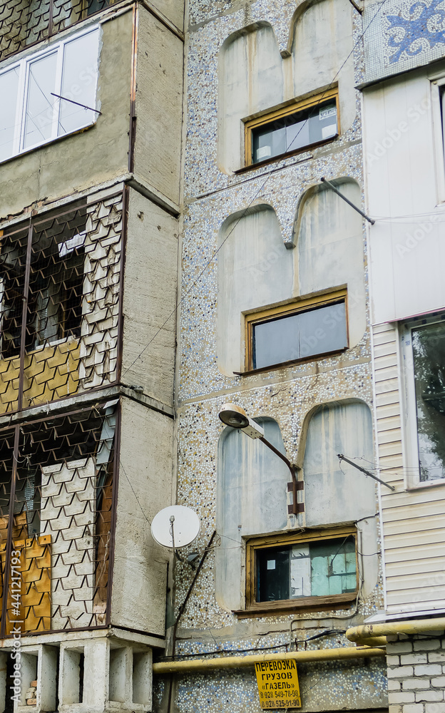 Colorful facade of a Soviet-built house. Derbent, Dagestan, Russia