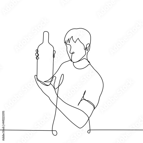 man shows the viewer a large bottle of wine - one line drawing vector. concept of winemaker, seller in wine shop, sommelier recommends wine photo