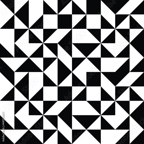 Abstract geometric pattern in black and white with random triangles and polygons, monochrome background