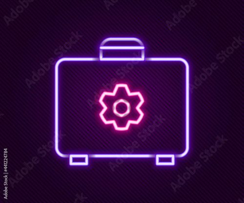 Glowing neon line Toolbox icon isolated on black background. Tool box sign. Colorful outline concept. Vector