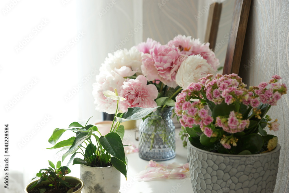Bouquet of pink peonies on the dresser in the bedroom Bouquet of pink peonies on the dresser in the bedroom