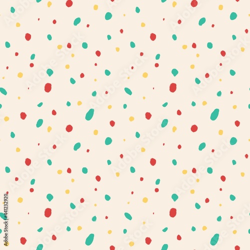Texture of messy tricolor dots tiled, red, green and yellow.