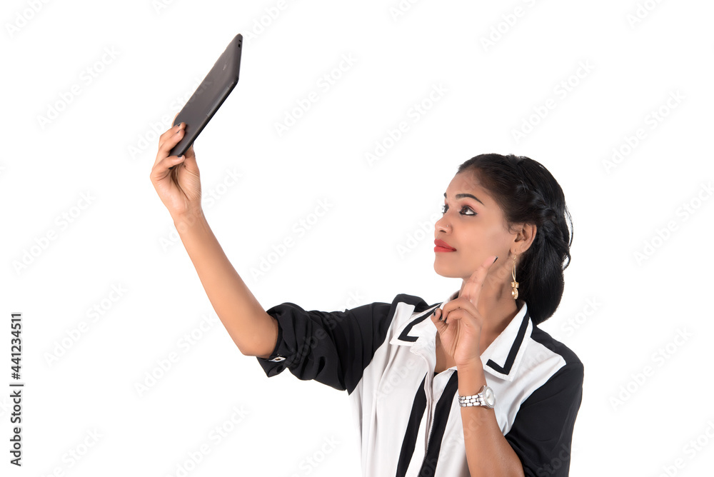 business woman using a mobile phone or smartphone isolated on a white background business woman using a mobile phone or smartphone isolated on a white background