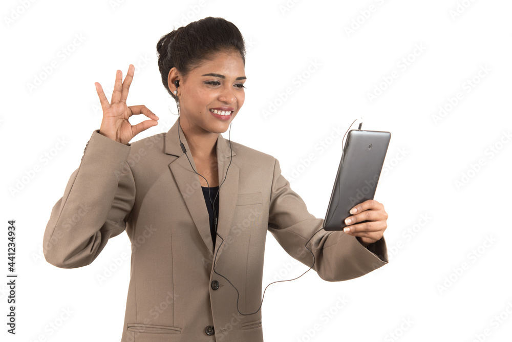 Beautiful woman talking in a video conference online by using smartphone Beautiful woman talking in a video conference online by using smartphone