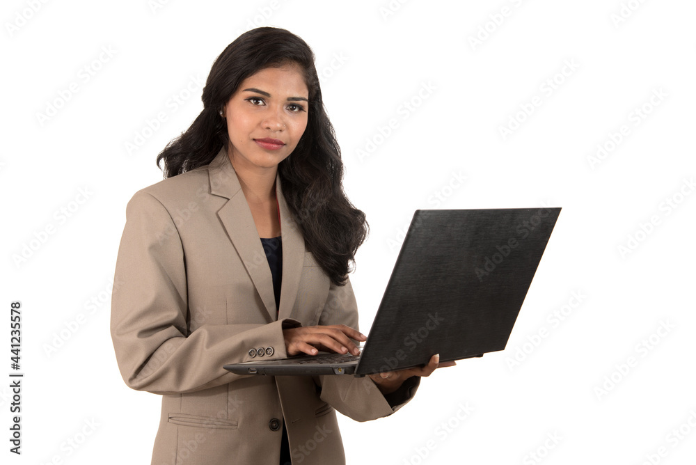 Young happy smiling woman holding laptop. Young happy smiling woman holding laptop.