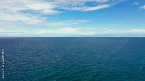 Wallpaper Mural Seascape, aerial view. Flight over the sea. Blue sea and sky with clouds. Summer and travel vacation concept. Torontodigital.ca