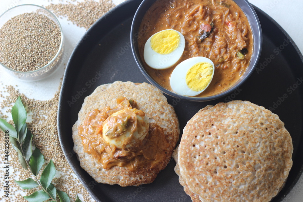 Kodo millet pancakes served with egg roast. Pancake is made with a
