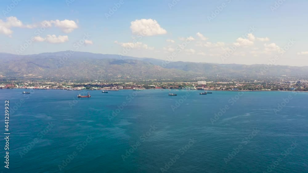 View from the sea to the city of Zamboanga.A major city on the island of Mindanao. Mindanao, Philippines. View from the sea to the city of Zamboanga.A major city on the island of Mindanao. Mindanao, Philippines.