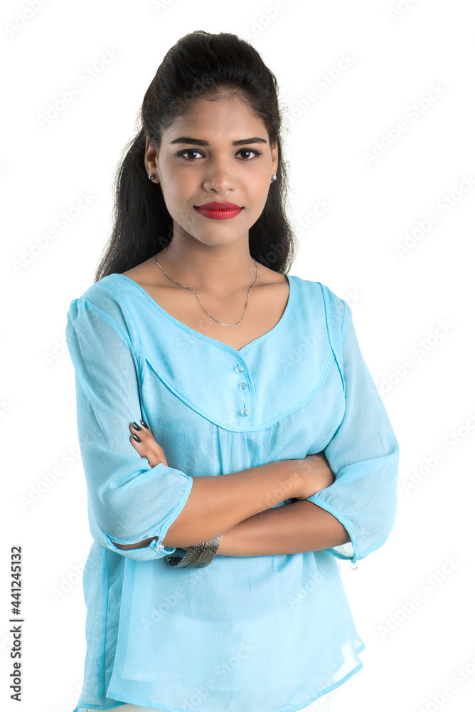Portrait of beautiful young smiling girl posing on white background Portrait of beautiful young smiling girl posing on white background