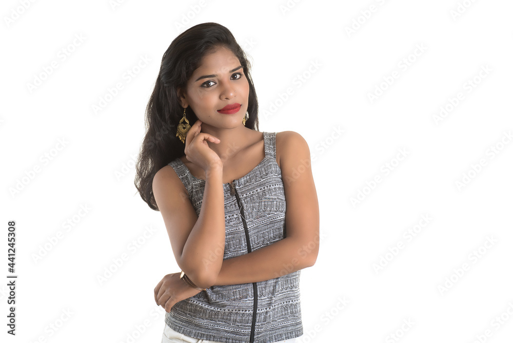 Portrait of beautiful young smiling girl posing on white background Portrait of beautiful young smiling girl posing on white background