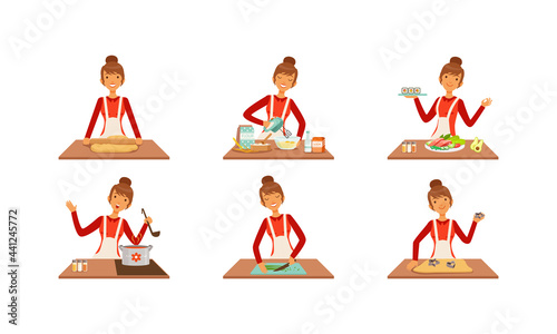 Young Woman Cooking and Baking at Kitchen Table Set, Cheerful Girl Preparing Food Cartoon Vector Illustration