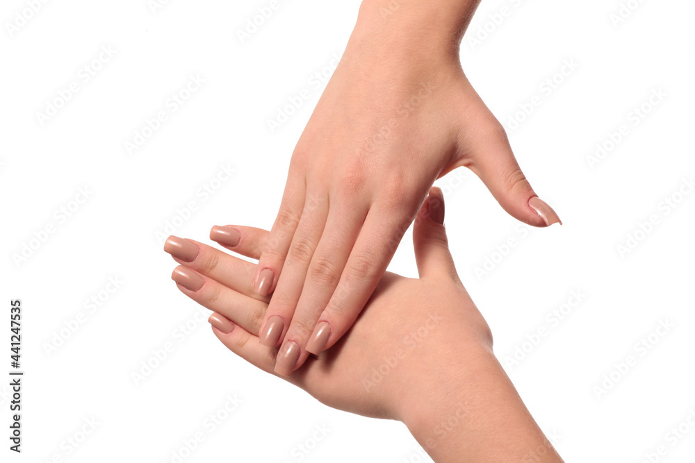 hand with nude manicure on white background