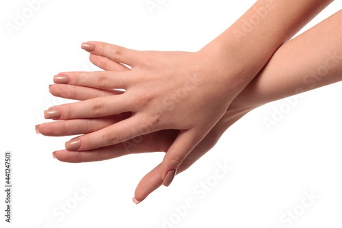 hand with nude manicure on white background