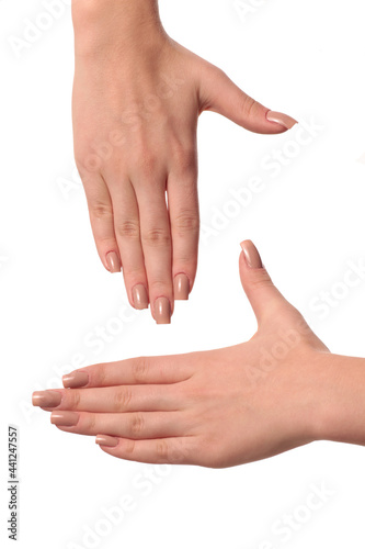 hand with nude manicure on white background