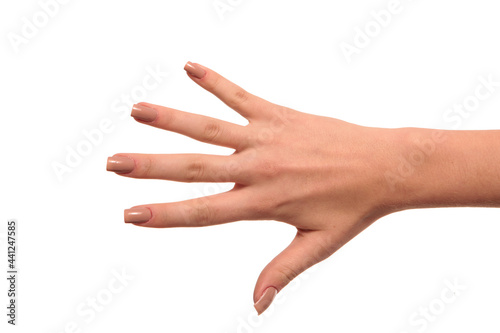 hand with nude manicure on white background