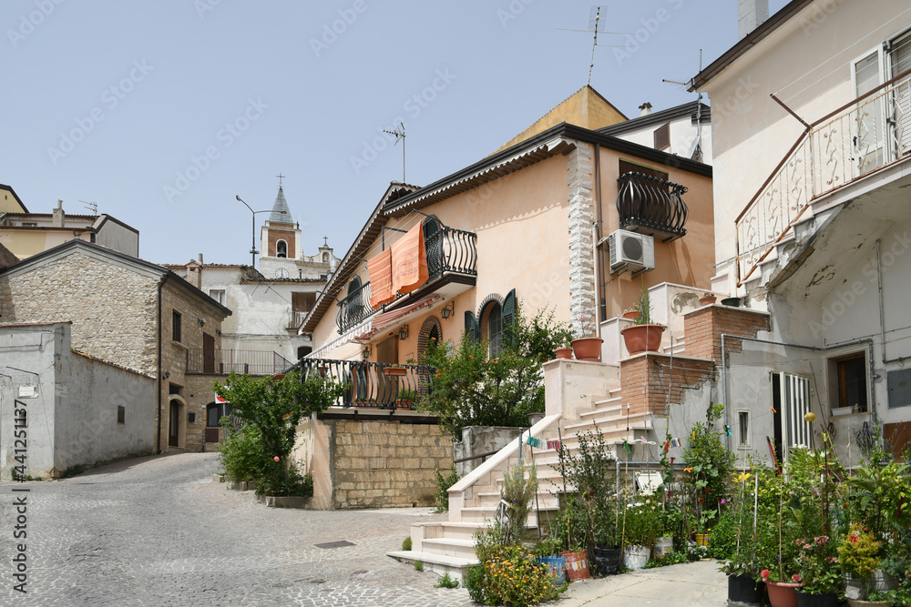 A small street between the old houses of Deliceto, a medieval village in the mountains of the Pugliaregion.