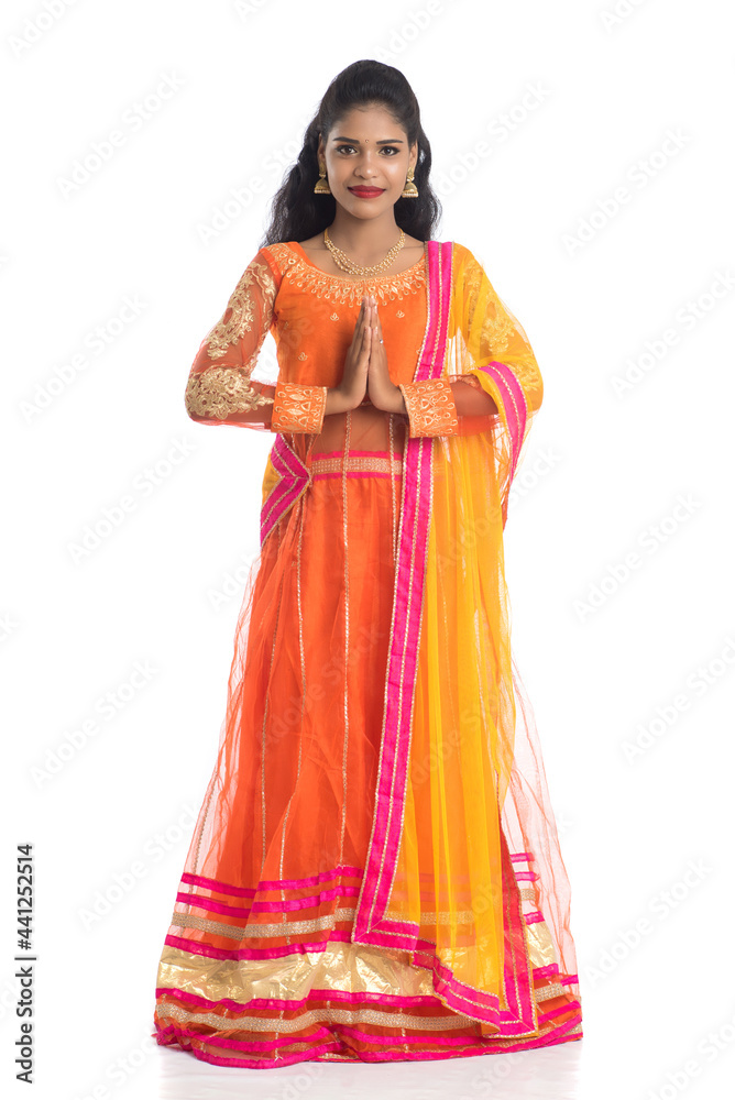 Beautiful Indian girl with welcome expression (inviting), greeting Namaste