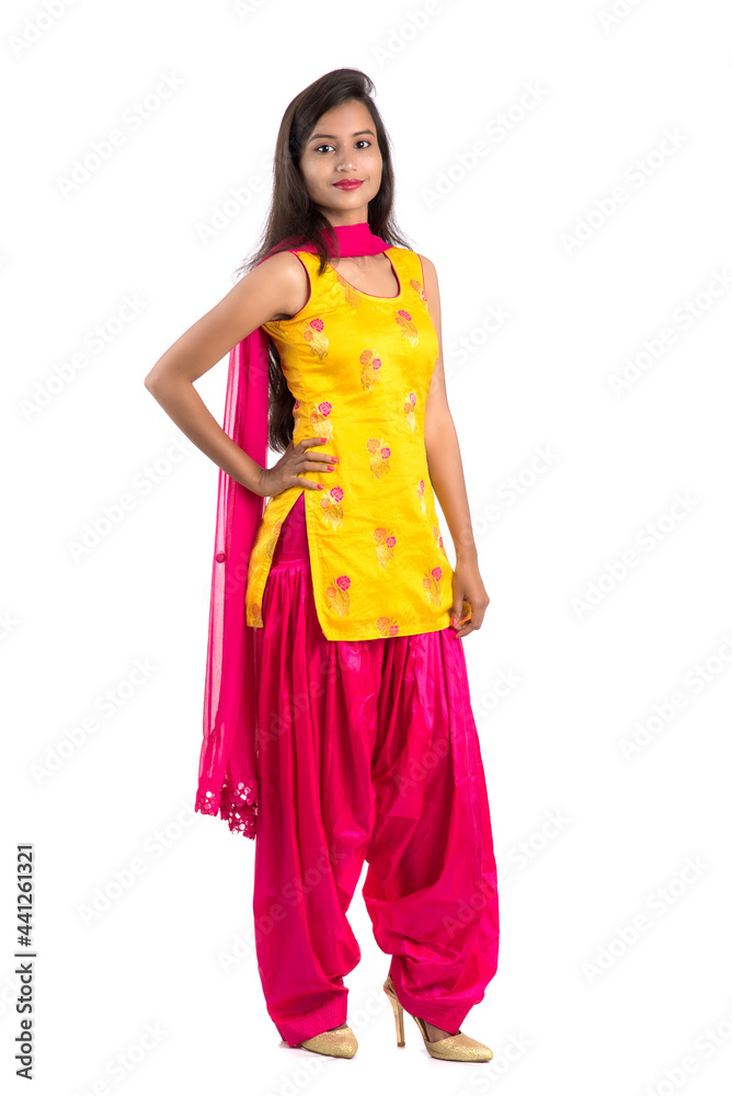 Beautiful Indian traditional girl posing on white background. Beautiful Indian traditional girl posing on white background.