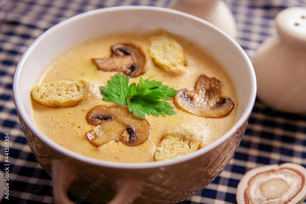 Mushrooms cream soup in the plate Mushrooms cream soup in the plate