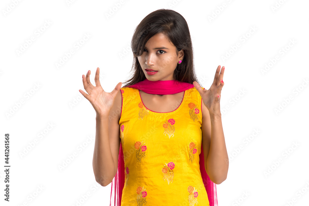 Portrait of a beautiful girl showing stop sign with palms isolated on a white background Portrait of a beautiful girl showing stop sign with palms isolated on a white background