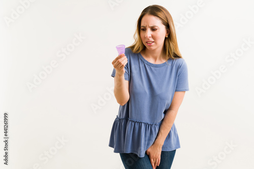 Woman deciding to use an alternative period product
