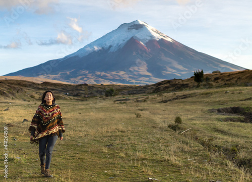 Woman walking near a mountain