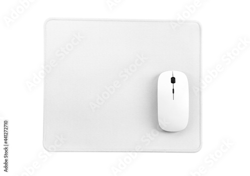 Computer mouse on white mouse pad isolated on a white background, top view