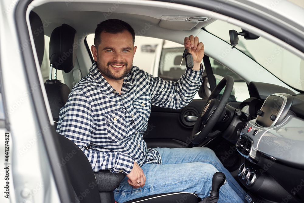 The man buys his first car. The man buys his first car.