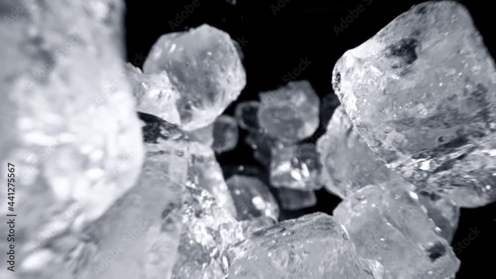 Super Slow Motion Shot of Ice Cubes Flying Towards Camera at 1000fps.