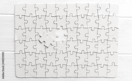 Top view of white jigsaw puzzle