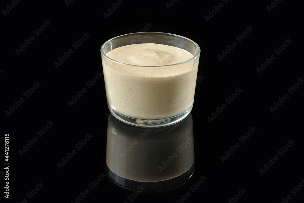 bowl of mayonnaise sauce isolated on black background with reflection bowl of mayonnaise sauce isolated on black background with reflection