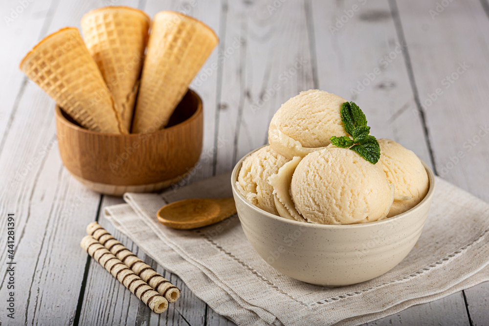 Bowl with vanilla ice cream balls. Bowl with vanilla ice cream balls.