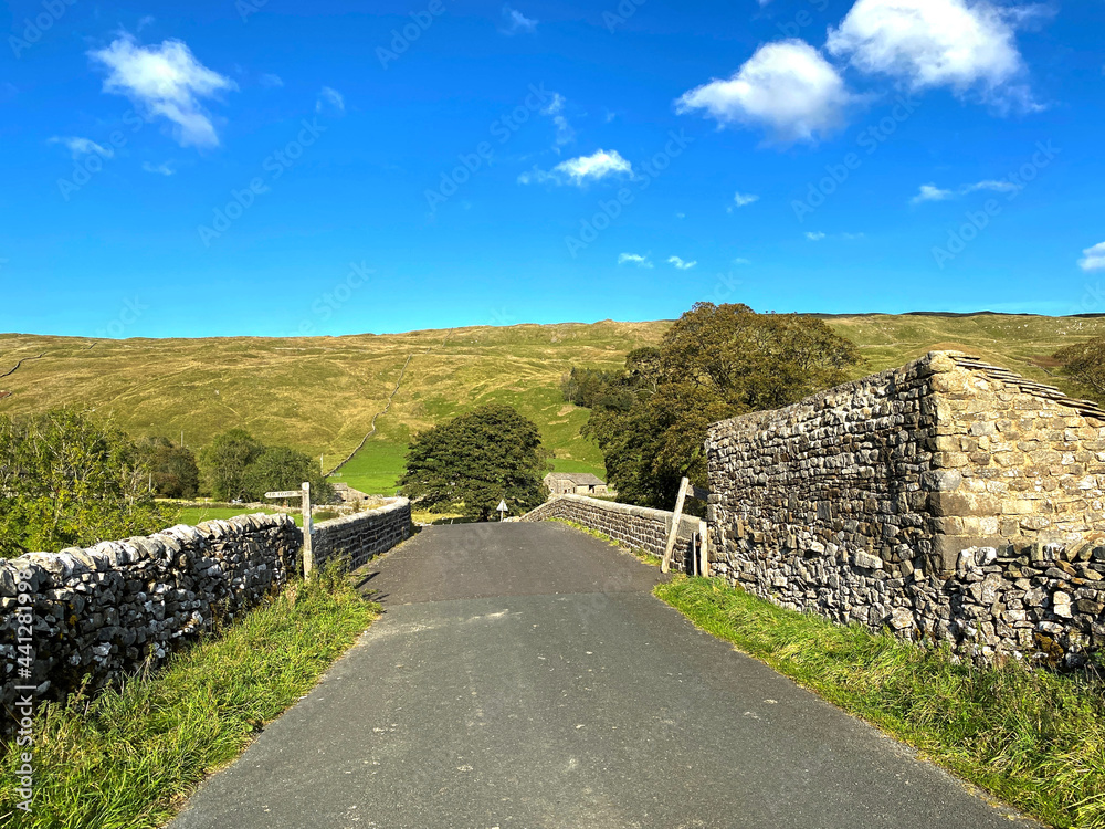 Looking over the old stone bridge, by the Yorkshire hamlet of, Halton Gill, Skipton, UK