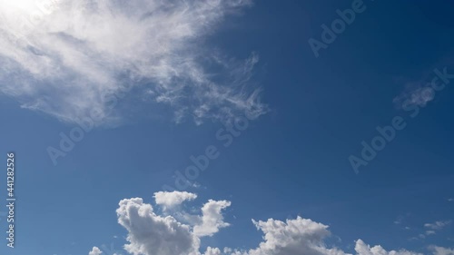 Amazing Time Lapse of Blue sky white clouds Puffy fluffy white clouds Cumulus cloud Flowing in the blue sky background cloudscape Timelapse Nature environment Good weather day photo