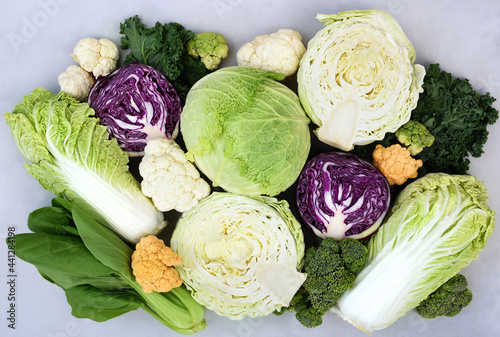Fresh harvested vegetables from market: white, red and savoy cabbage, broccoli and colorful cauliflower, napa cabbage and bok choy(pak choi)