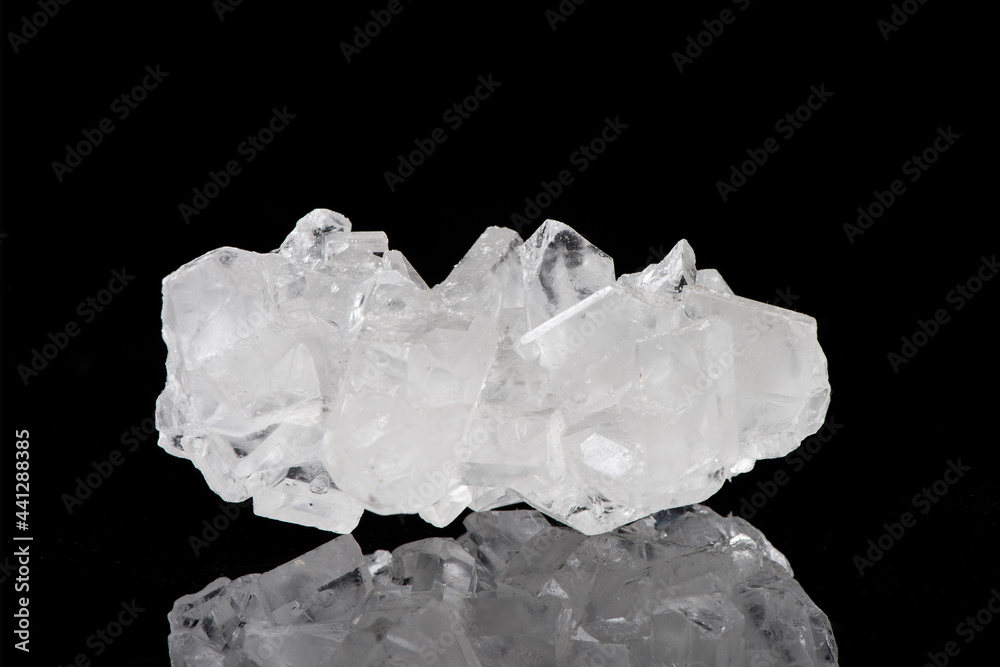 big lumps white rock candy sugar isolated on black background