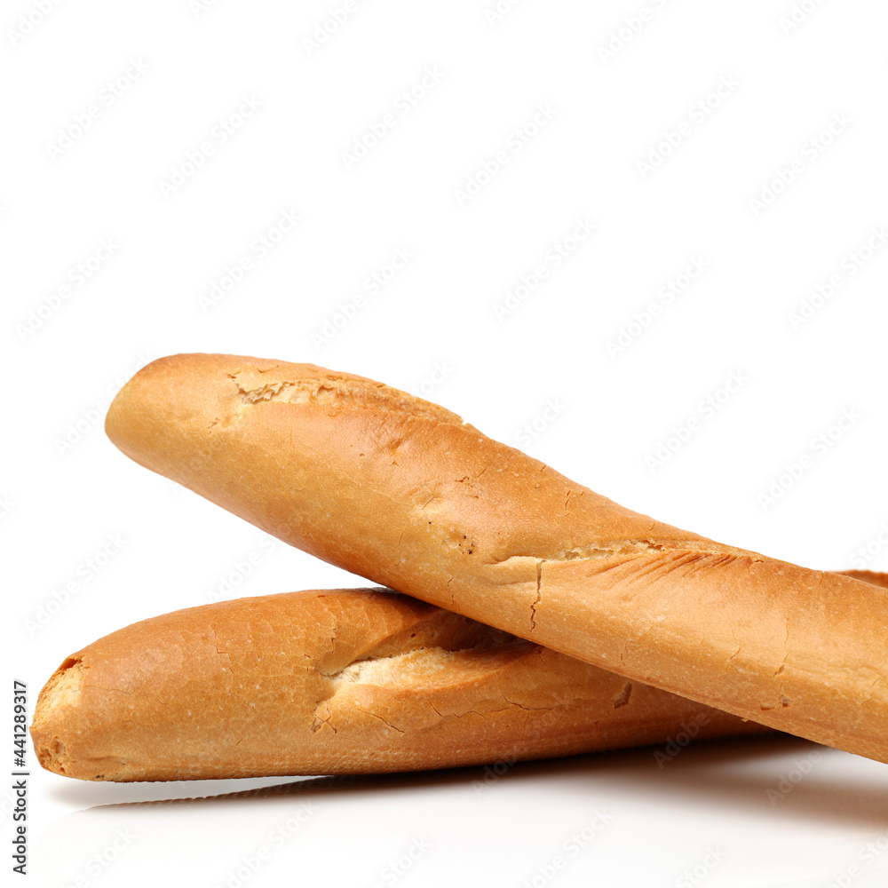 crusty mini baguettes on white background