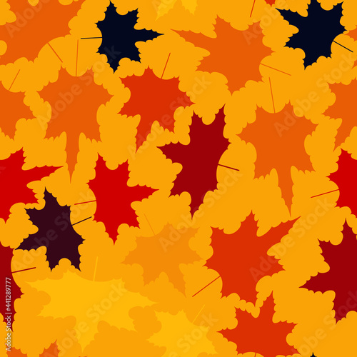 Seamless autumn baby pattern with yellow, red and black hand drawn maple leaves on a orange background. The pattern can be used for wrapping papers, cards, wallpapers, covers, textile prints. Vector