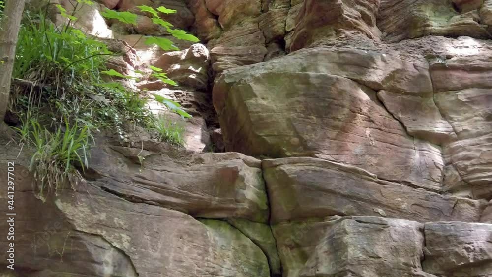 Layered sandstone rock surface rough mountain wall geology in national park trail dolly left Layered sandstone rock surface rough mountain wall geology in national park trail dolly left