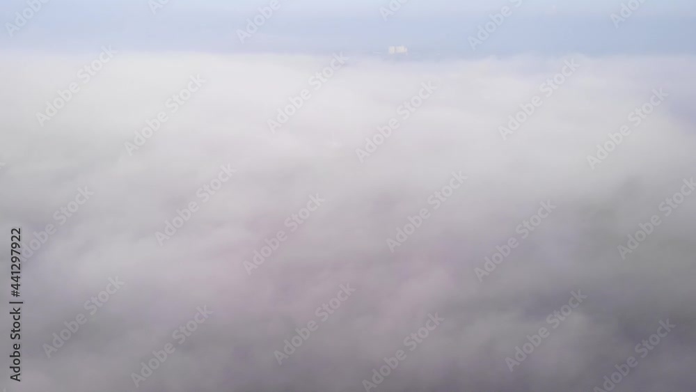 Vague Figure Of A Ship Passing By The Thick Fog Covering The River In Zwijndrecht. static shot Vague Figure Of A Ship Passing By The Thick Fog Covering The River In Zwijndrecht. static shot